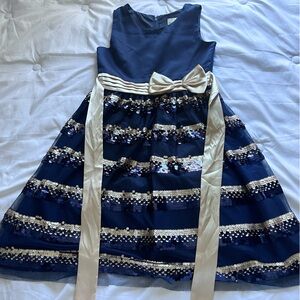 Only worn once. Beautiful dress for special occasions/events.